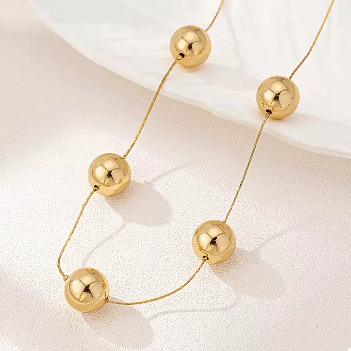 Golden Sphere Statement Necklace by Trendsi