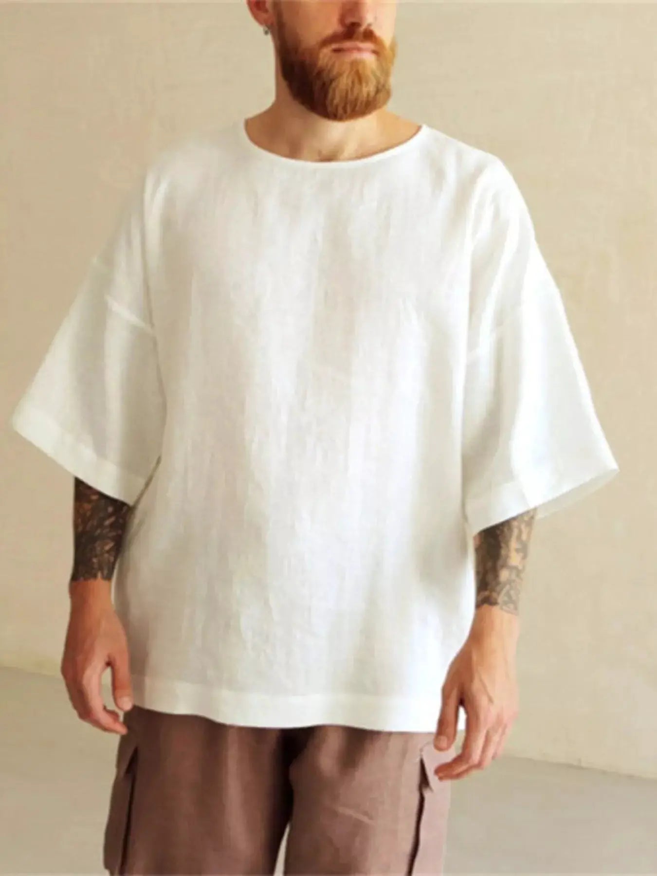 Men's Full Size Loose Fit Round Neck T-Shirt Plus Size by Trendsi