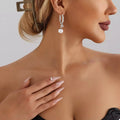 Asymmetrical Pearl Drop Hoop Earrings by Trendsi