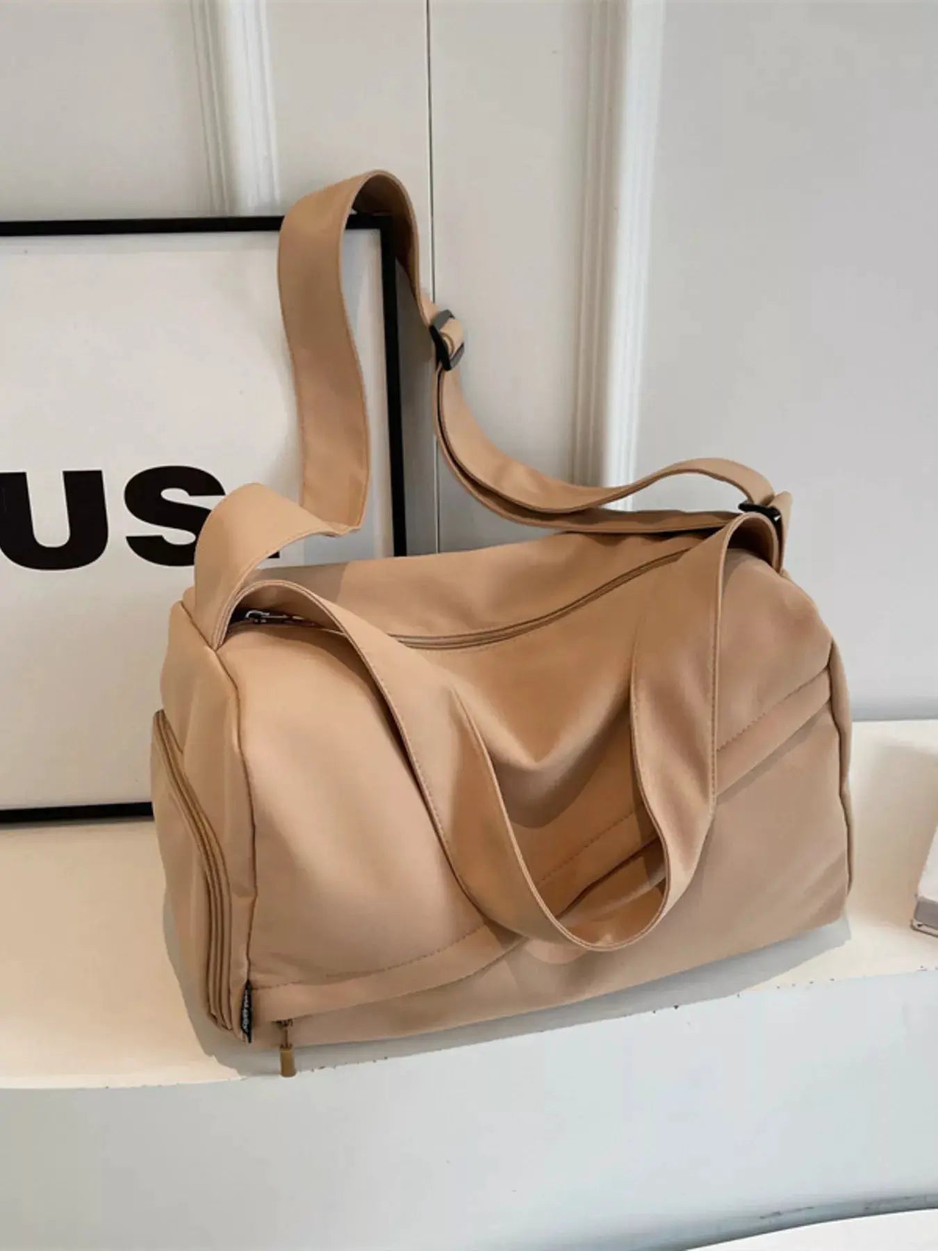 Adjustable Strap Solid Color Travel Bag by Trendsi