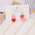 Sweet Doubl Heart Drop Earrings by Trendsi