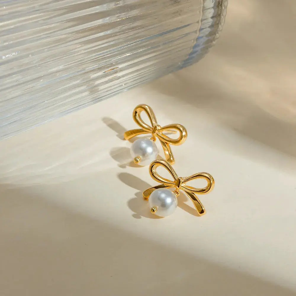 Stainless Steel Bow Pearl Earrings by Trendsi
