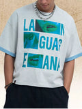 Men's Graphic Round Neck Short Sleeve Top by Trendsi