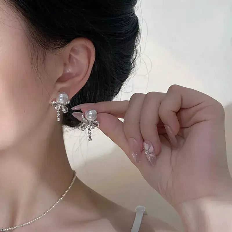 Pearl & Bow Drop Earrings by Trendsi