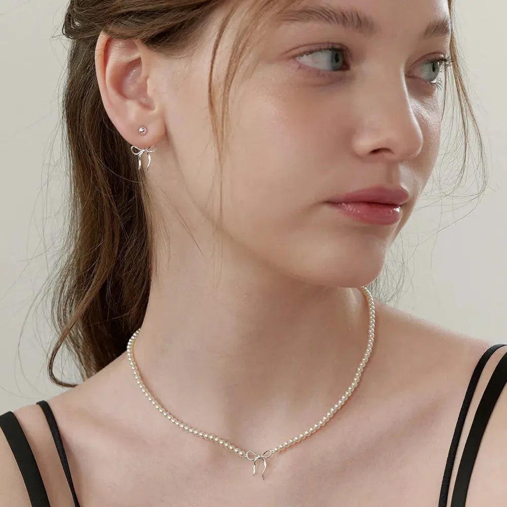 Copper Pearls Bow Necklace by Trendsi