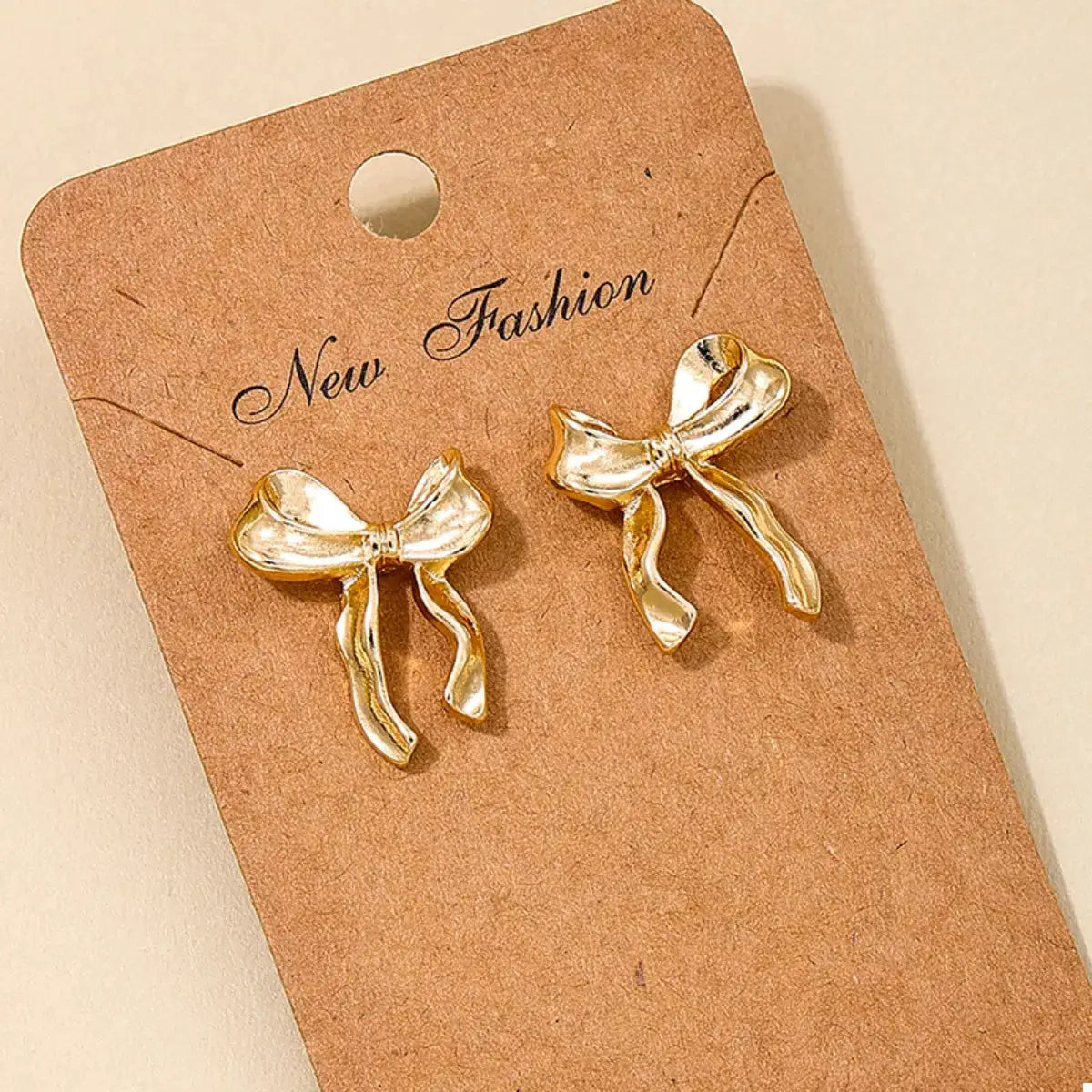 18K Gold-Plated Alloy Bow Stud Earrings by Trendsi