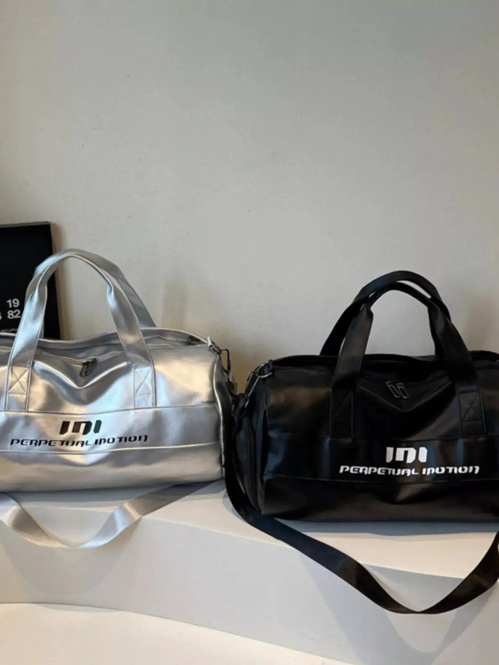 Lightweight Travel Duffel Bag with Shoulder Strap by Trendsi