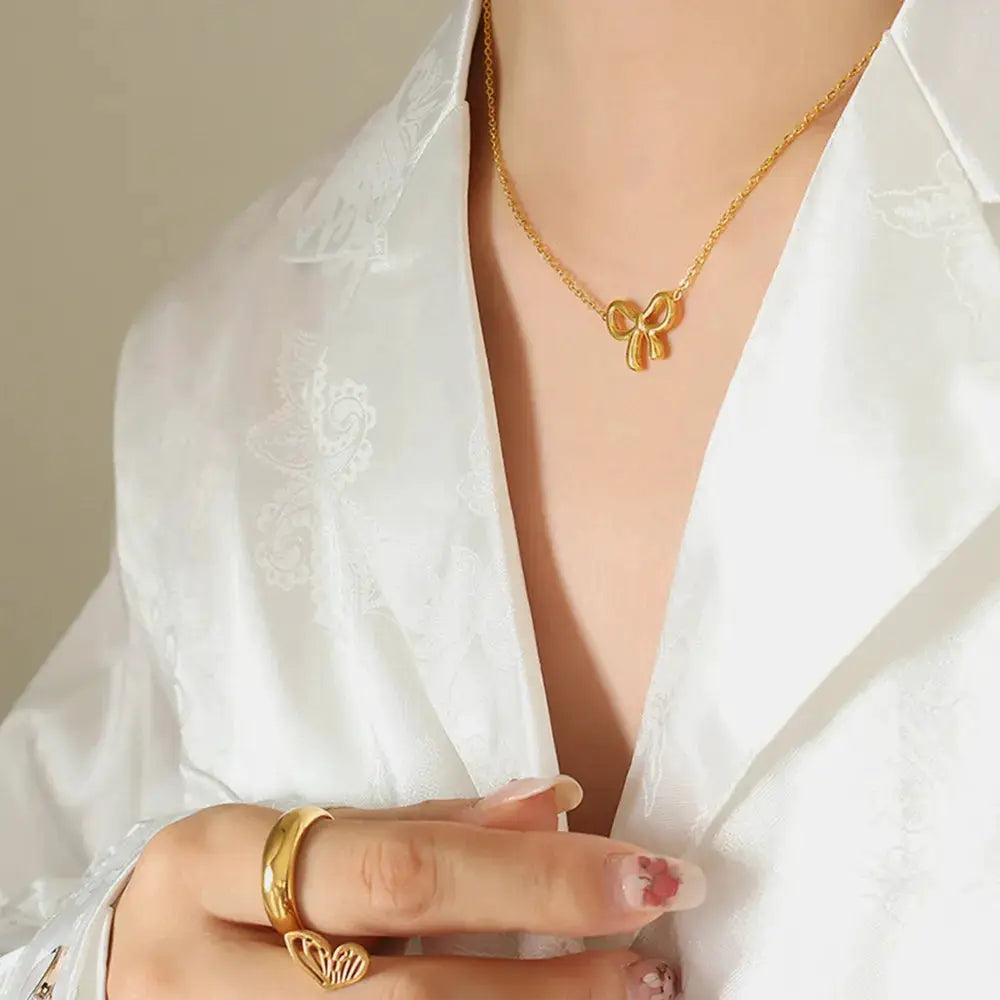 Gold-Plated Titanium Steel Bow Pendant Necklace by Trendsi