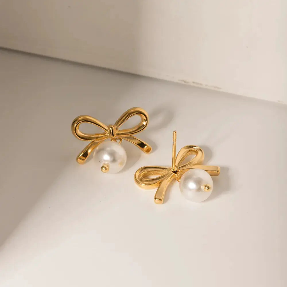 Stainless Steel Bow Pearl Earrings by Trendsi