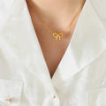 Gold-Plated Titanium Steel Bow Pendant Necklace by Trendsi