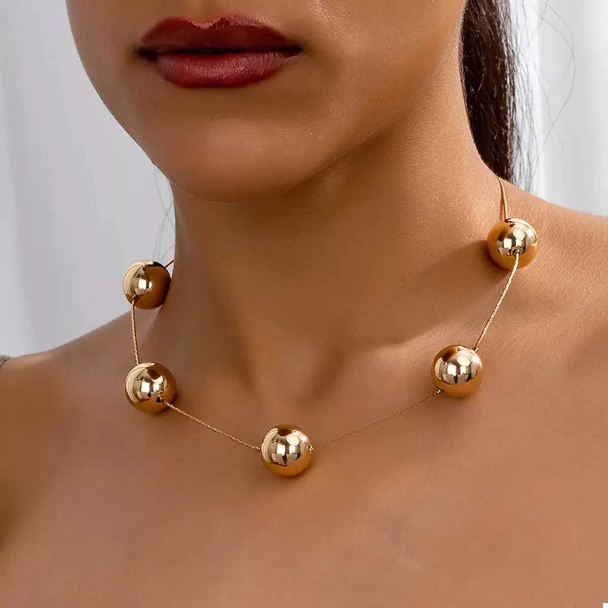 Golden Sphere Statement Necklace by Trendsi