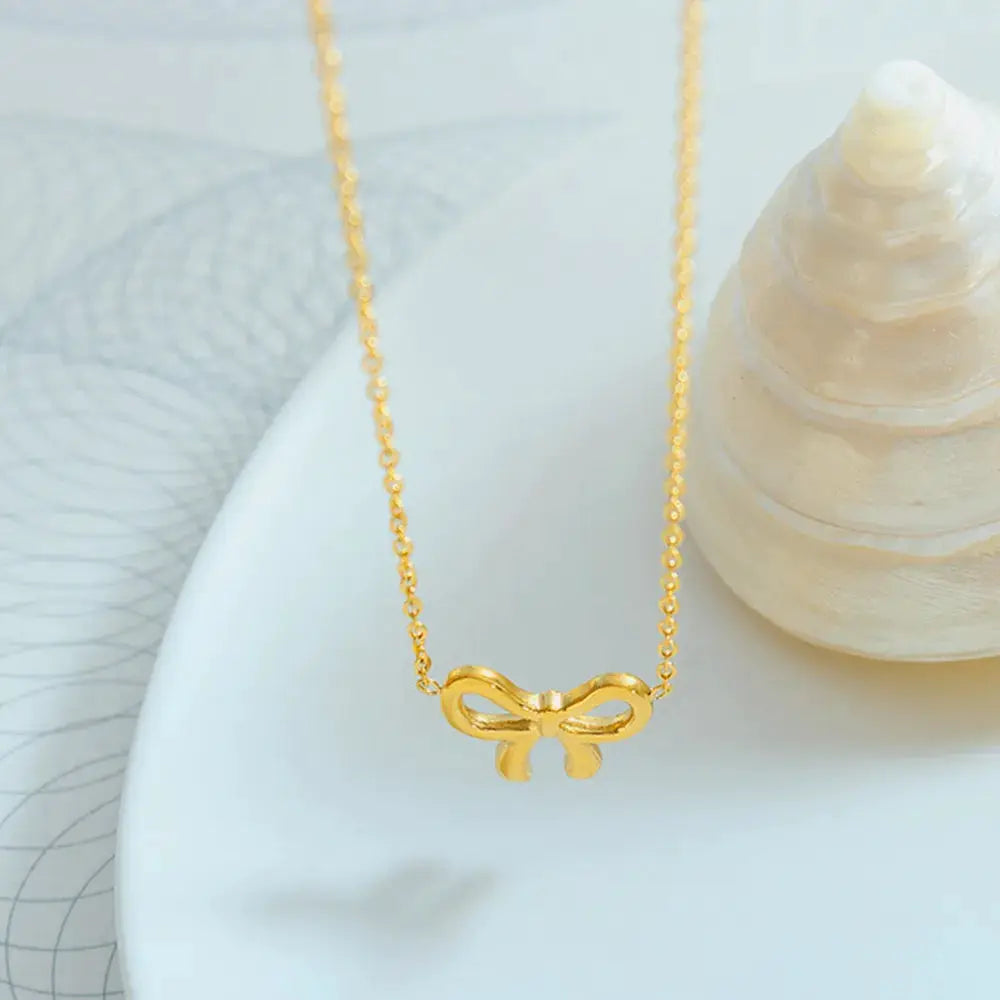Gold-Plated Titanium Steel Bow Pendant Necklace by Trendsi
