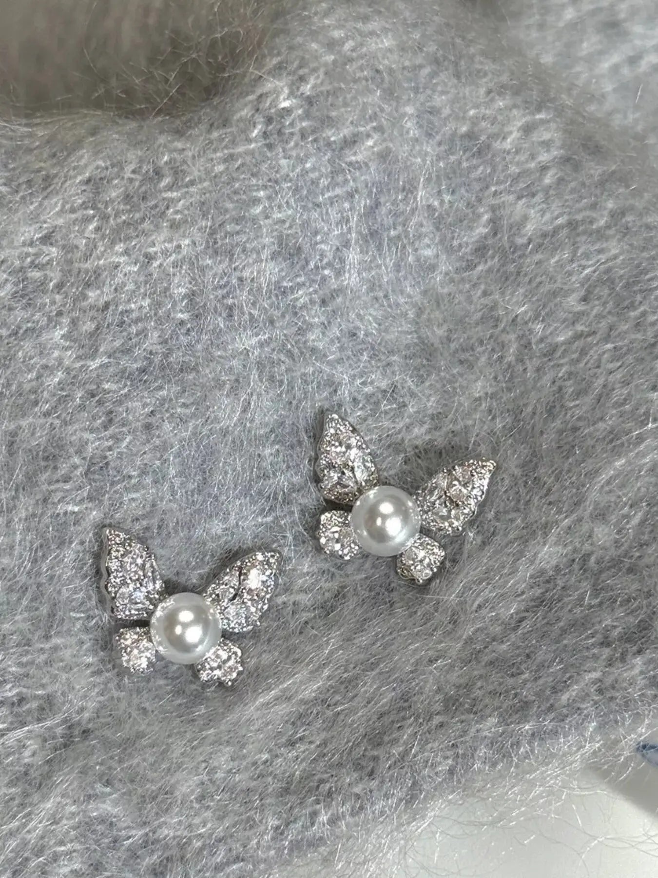 Butterfly Pearl Stud Earrings by Trendsi