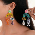 Evil Eye & Fish Dangle Earrings by Trendsi