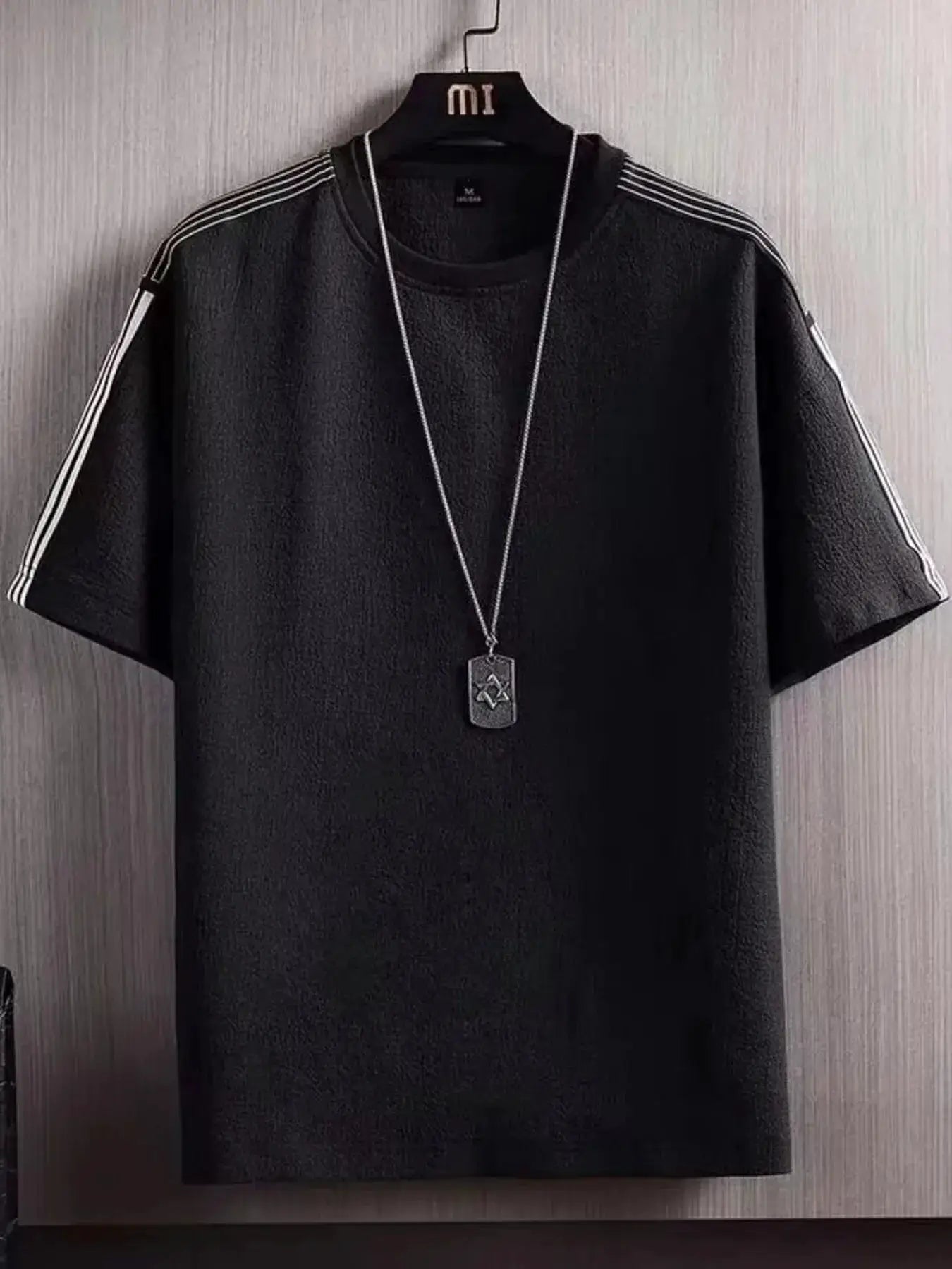 Men's Plus Size Textured Round Neck T-Shirt by Trendsi