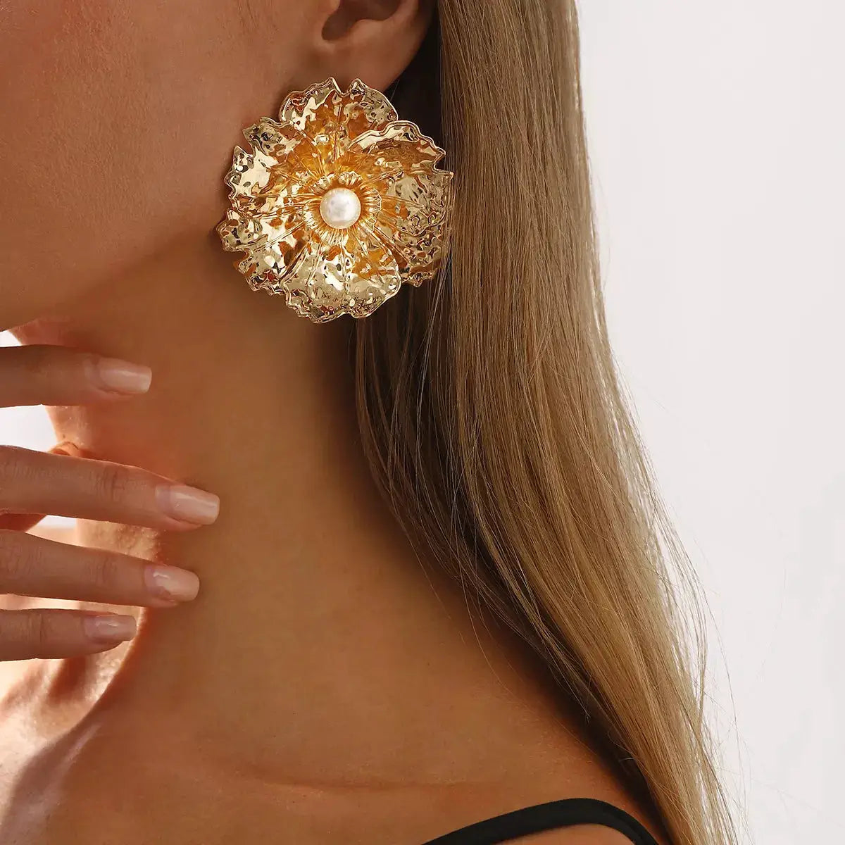 Gold Textured Flower Pearl Center Statement Earrings by Trendsi