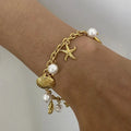 Ocean Theme Stainless Steel Chain Bracelet with Seashell and Starfish Pendants by Trendsi