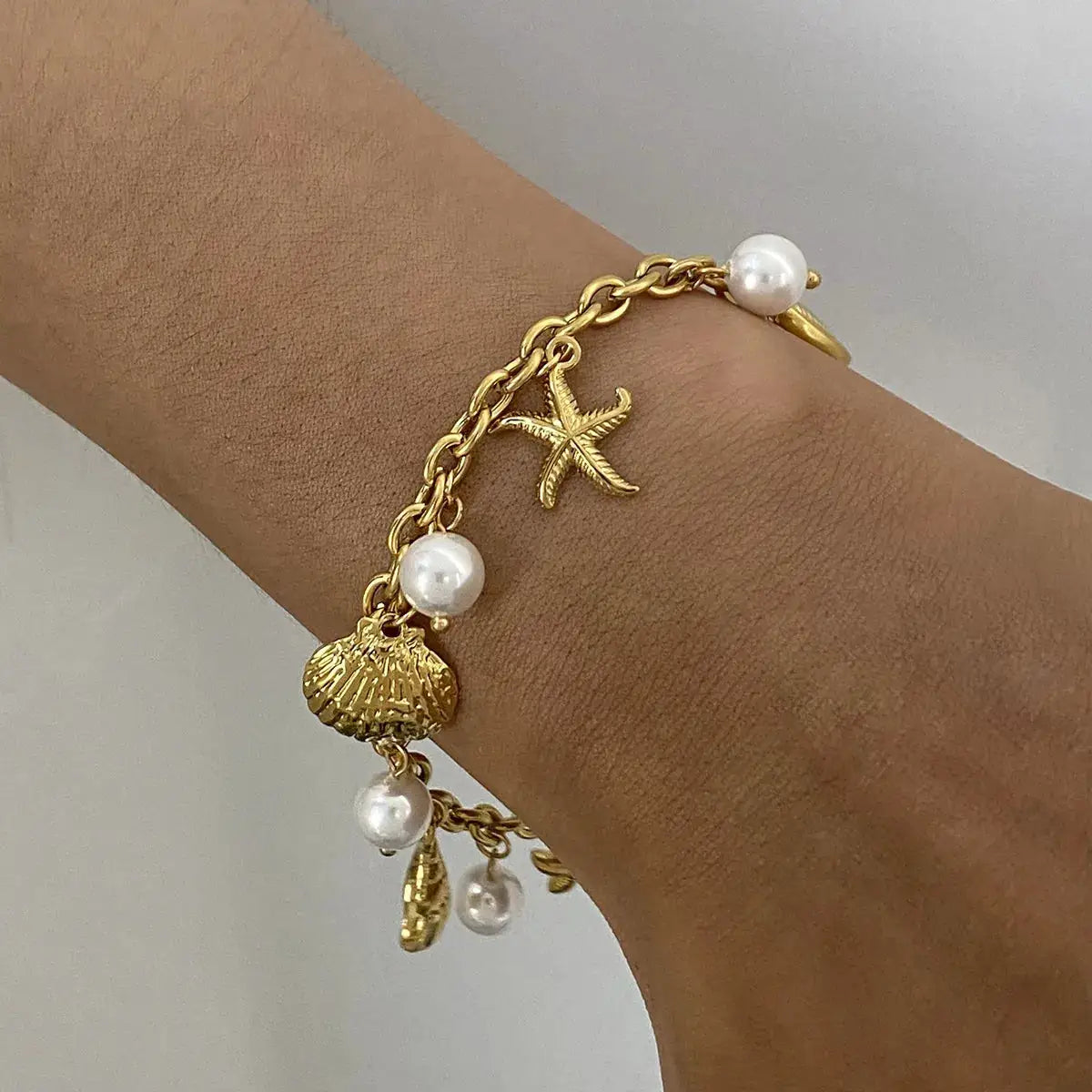 Ocean Theme Stainless Steel Chain Bracelet with Seashell and Starfish Pendants by Trendsi