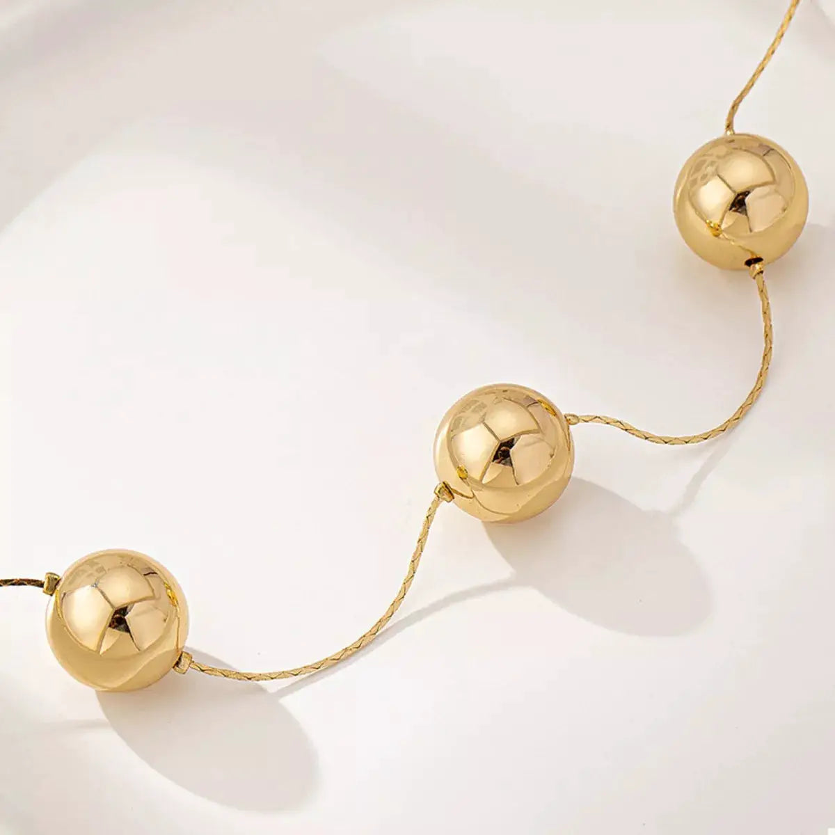 Golden Sphere Statement Necklace by Trendsi