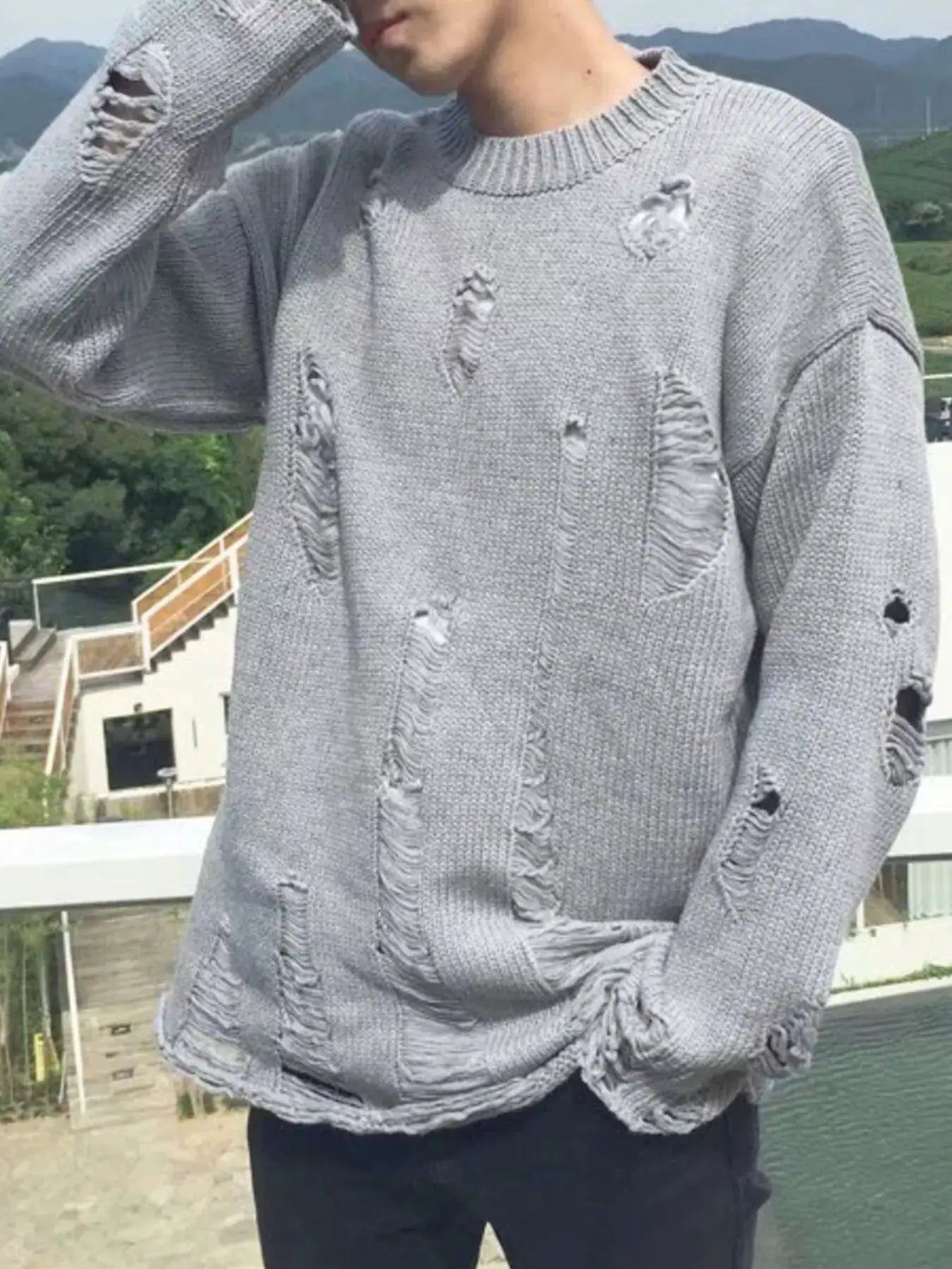 Men's Distressed Round Neck Sweater by Trendsi