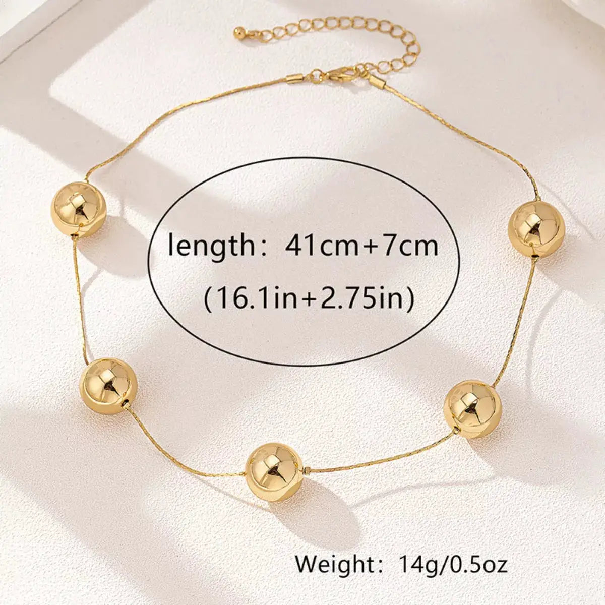 Golden Sphere Statement Necklace by Trendsi