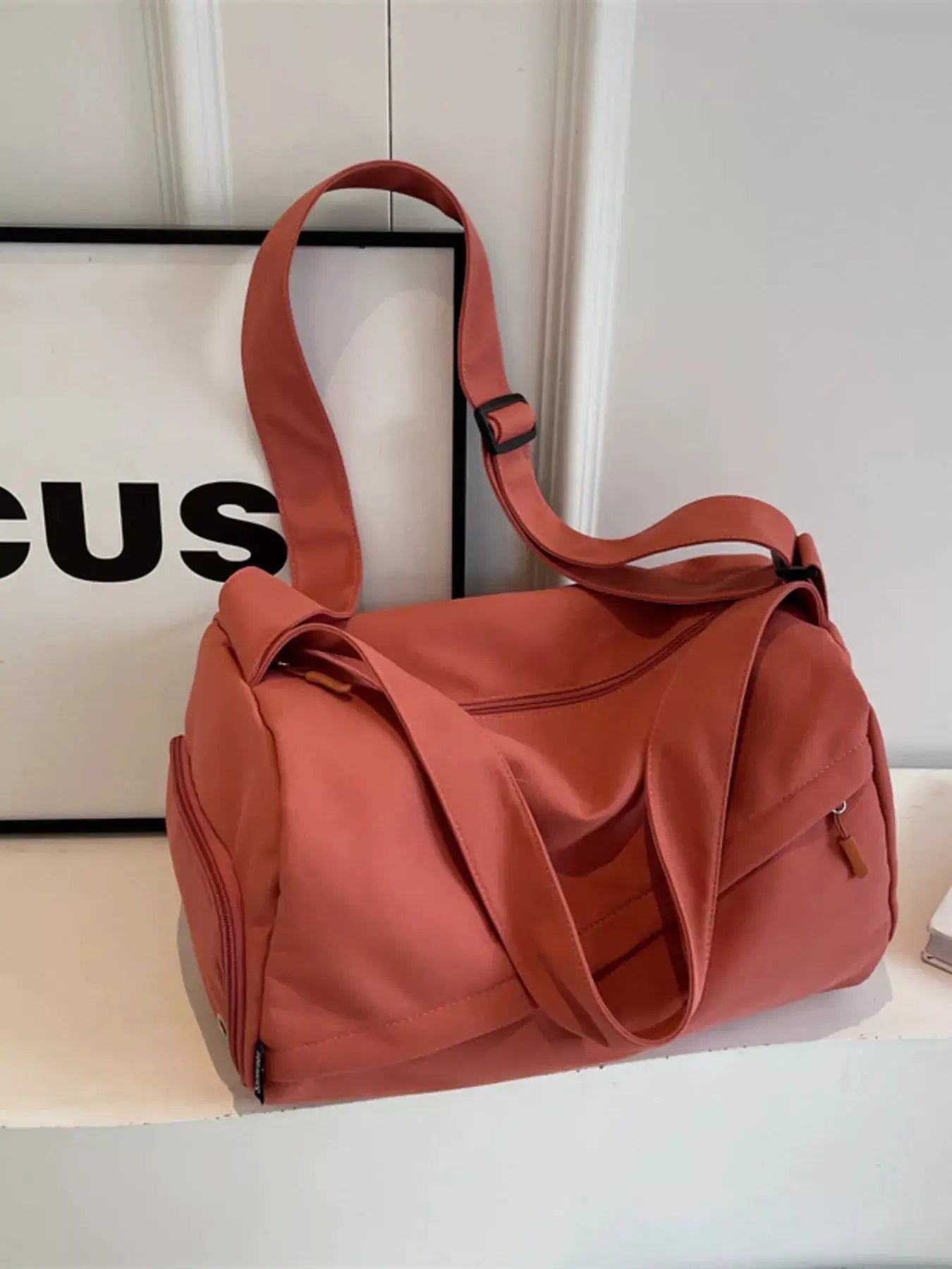 Adjustable Strap Solid Color Travel Bag by Trendsi