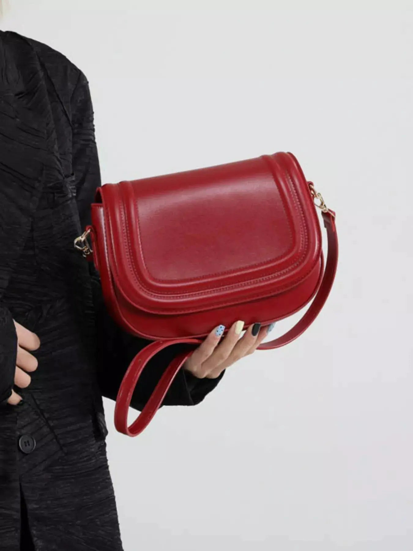 Elegant PU Leather Saddle Crossbody Bag by Trendsi