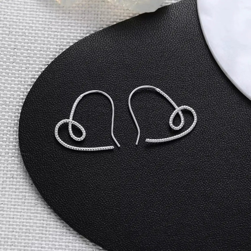 Heart-Shaped Dangle Earrings by Trendsi