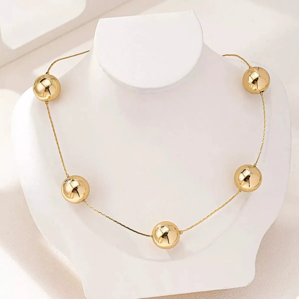Golden Sphere Statement Necklace by Trendsi