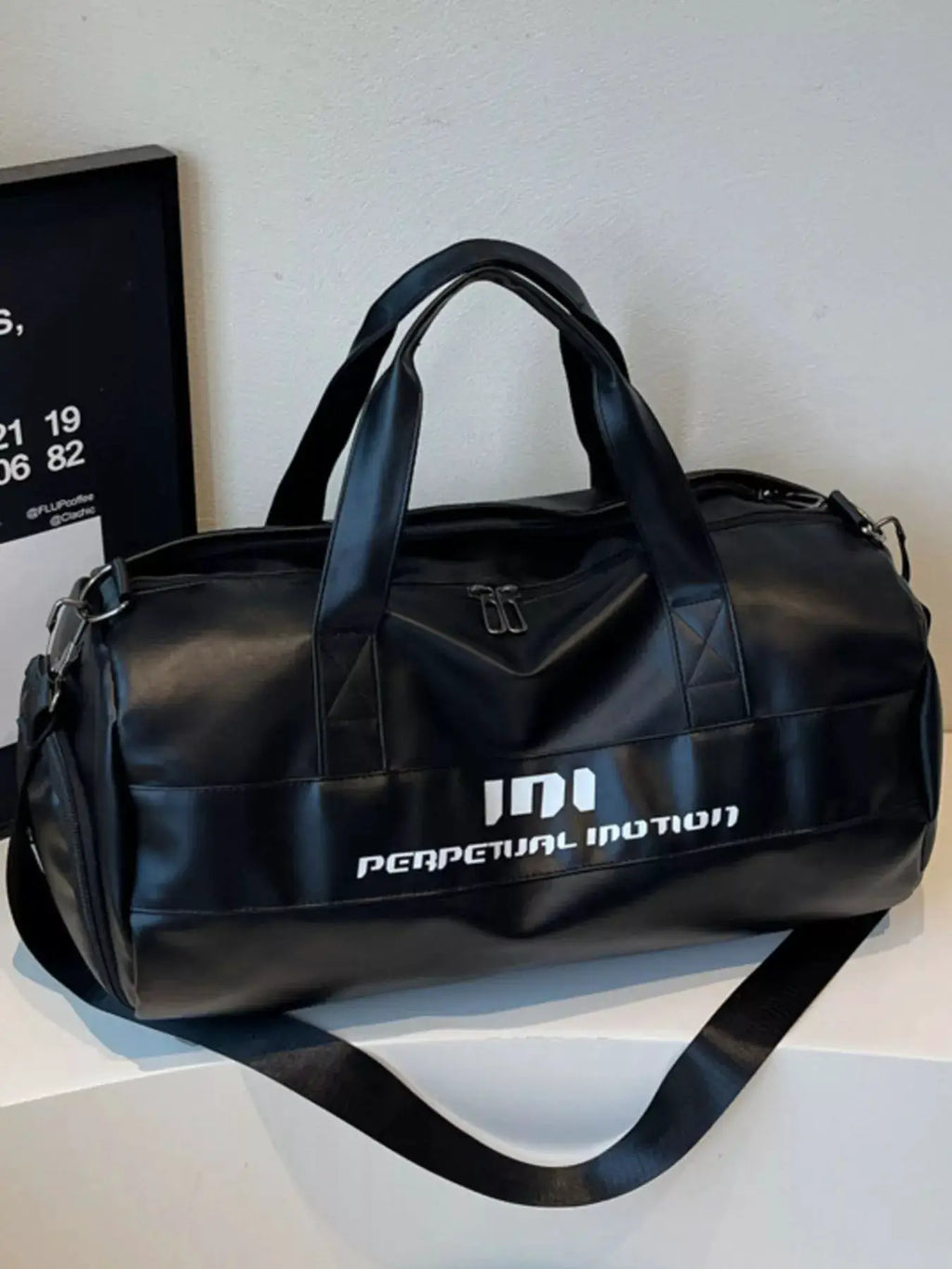 Lightweight Travel Duffel Bag with Shoulder Strap by Trendsi