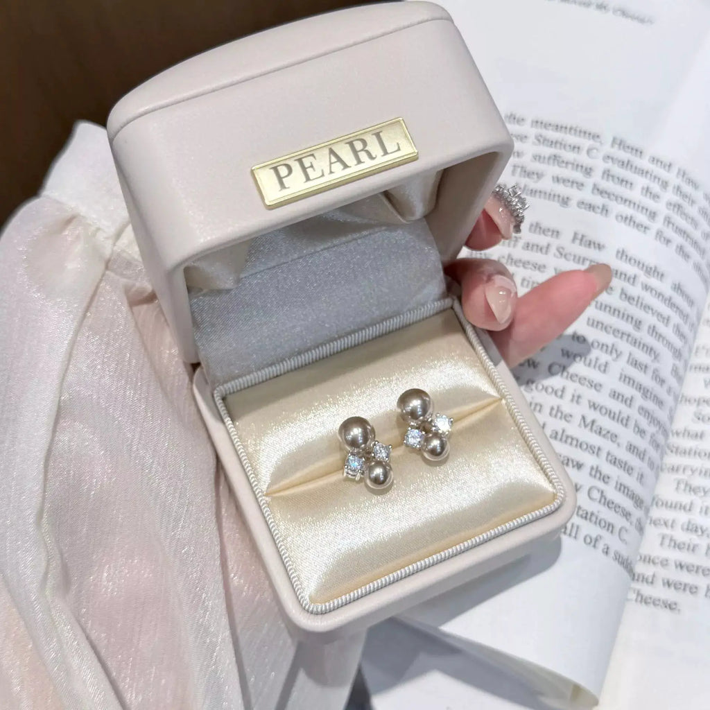 Pearl Stud Earrings by Trendsi