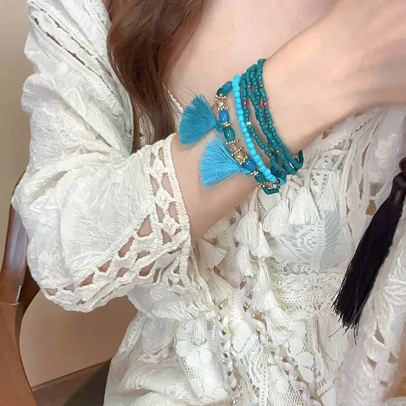 Tassel Rice Bead Bracelet by Trendsi