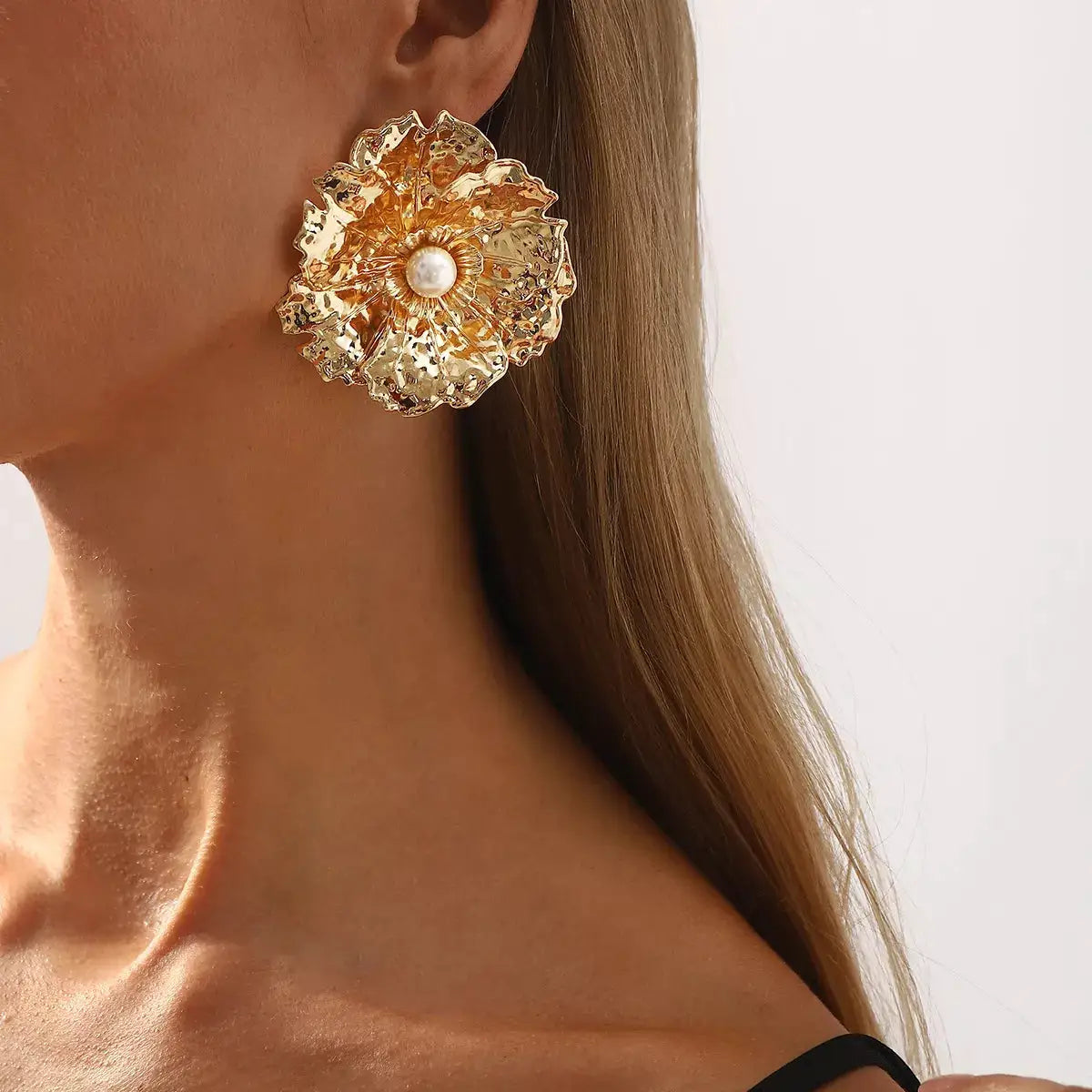 Gold Textured Flower Pearl Center Statement Earrings by Trendsi