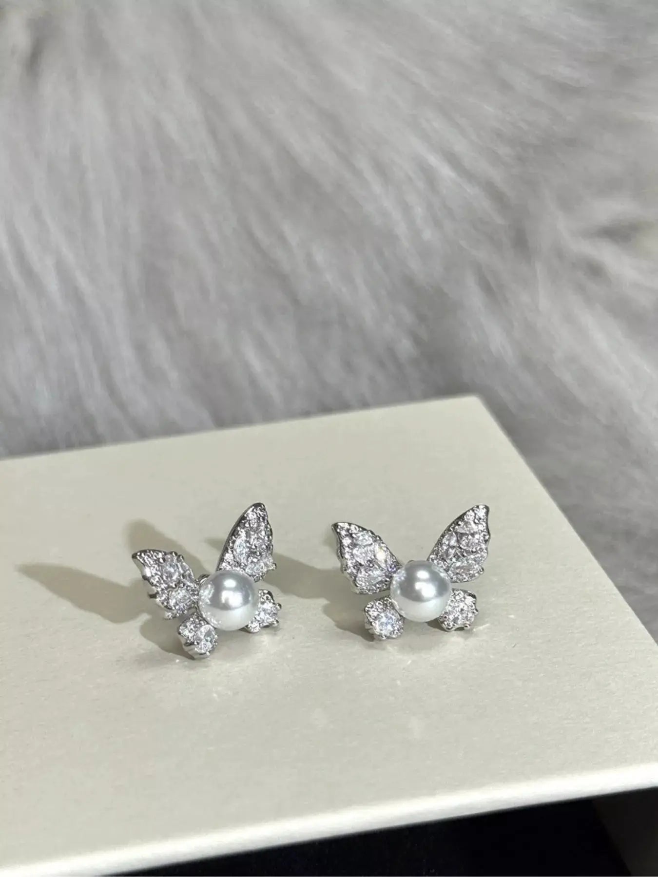 Butterfly Pearl Stud Earrings by Trendsi