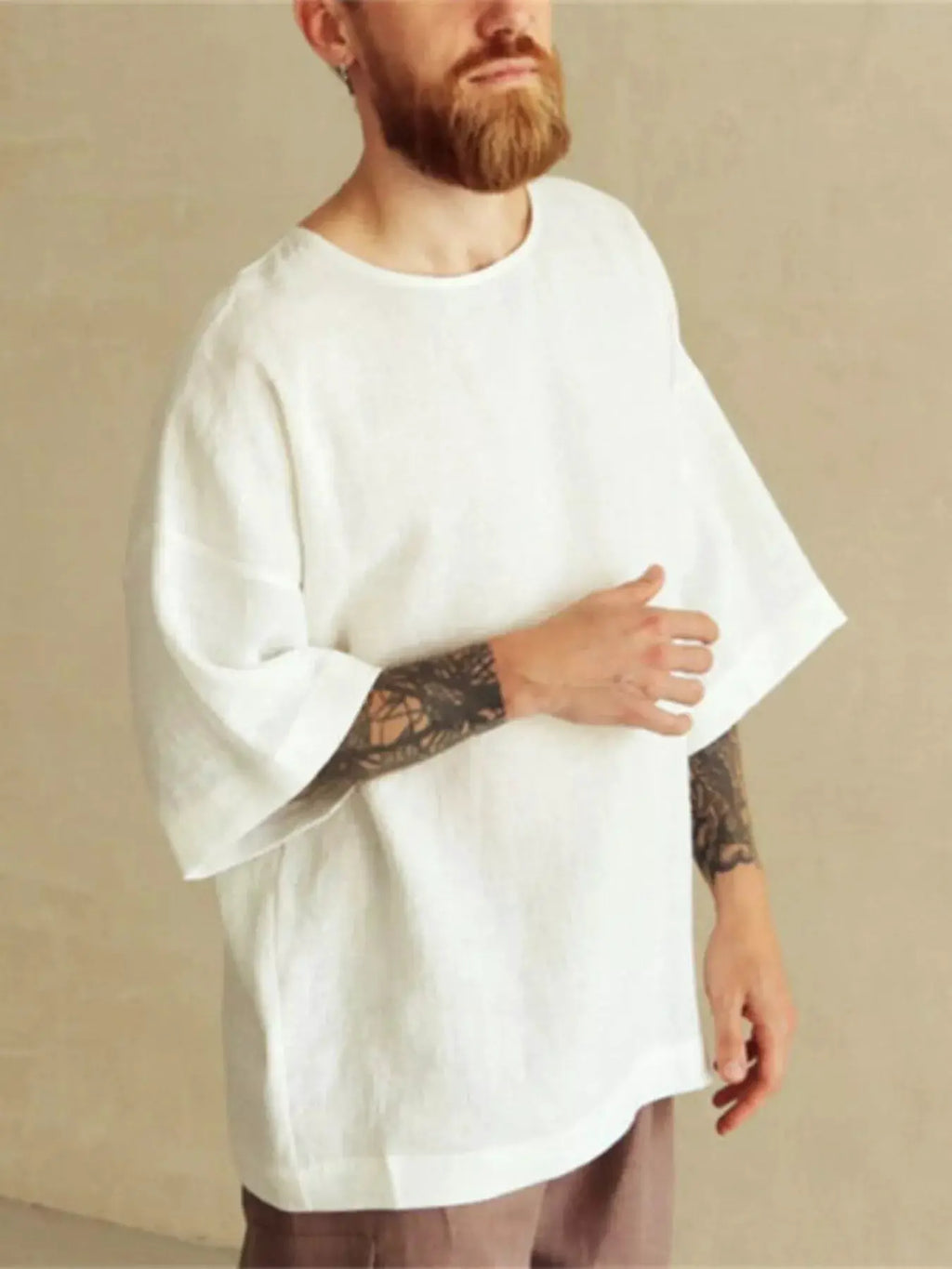 Men's Full Size Loose Fit Round Neck T-Shirt Plus Size by Trendsi