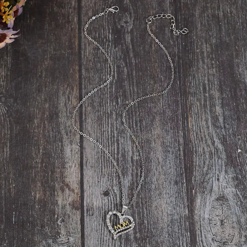 Alloy Inlaid Zircon Heart Pendant Necklace by Trendsi