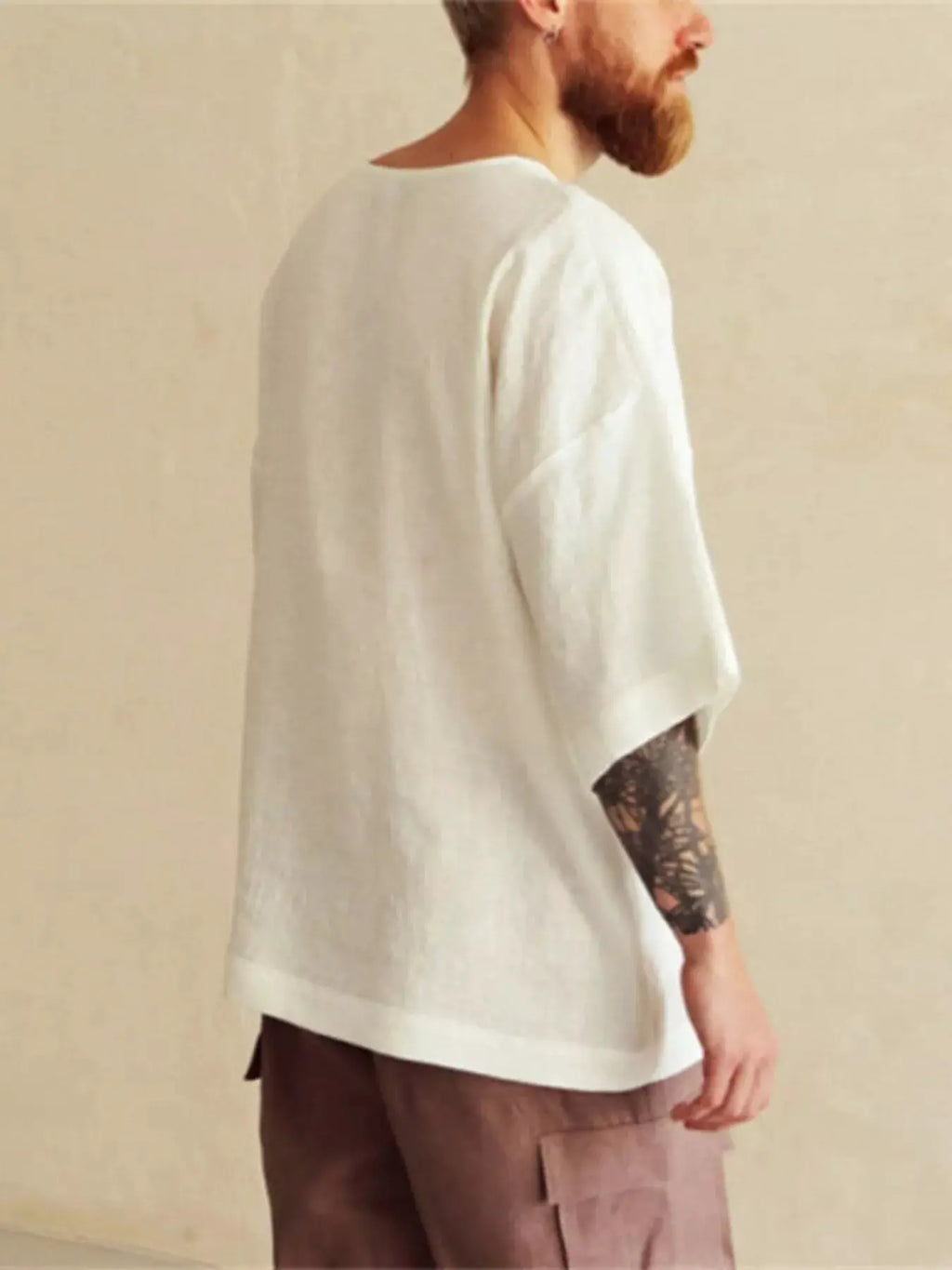 Men's Full Size Loose Fit Round Neck T-Shirt Plus Size by Trendsi